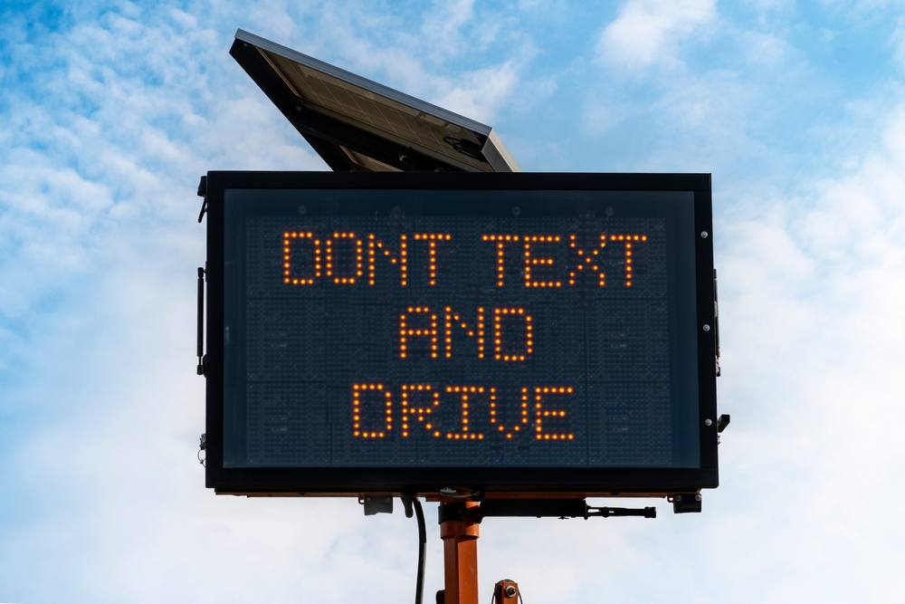 dont text and drive freeway sign in California